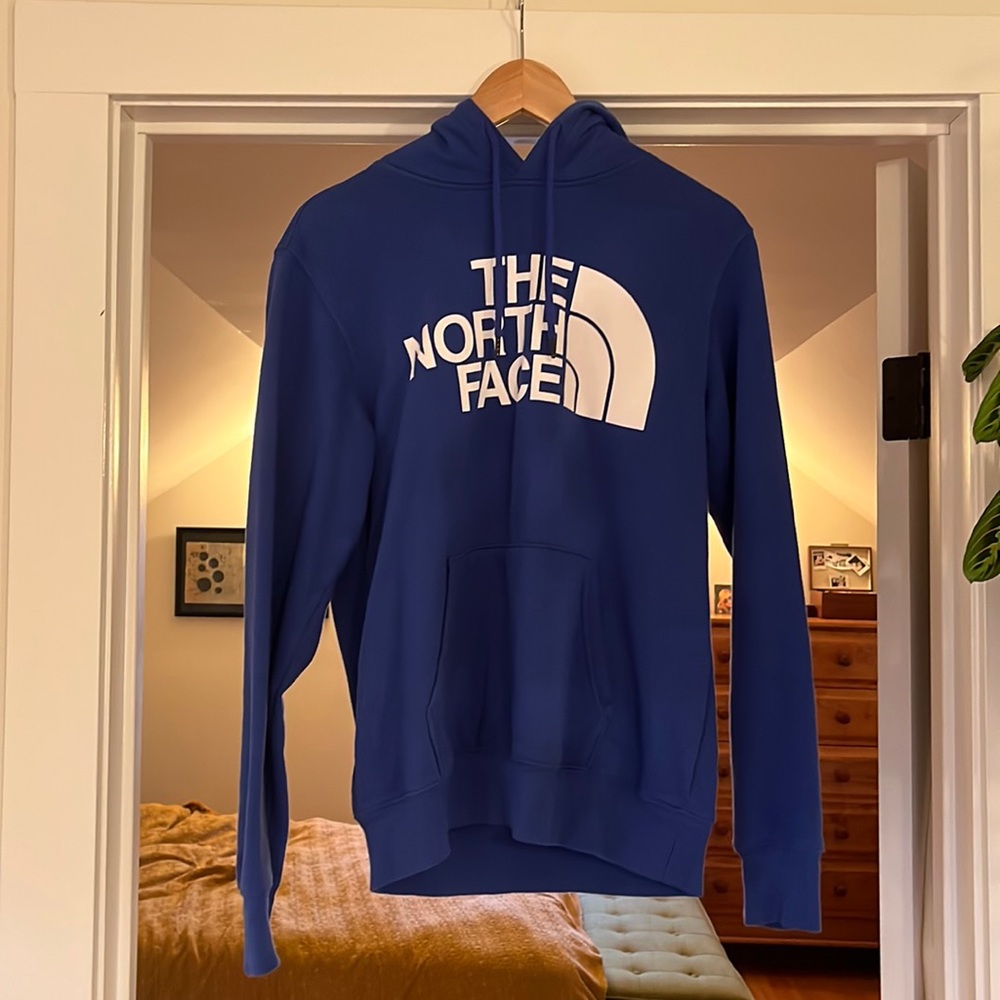 Small, blue north face hoodie